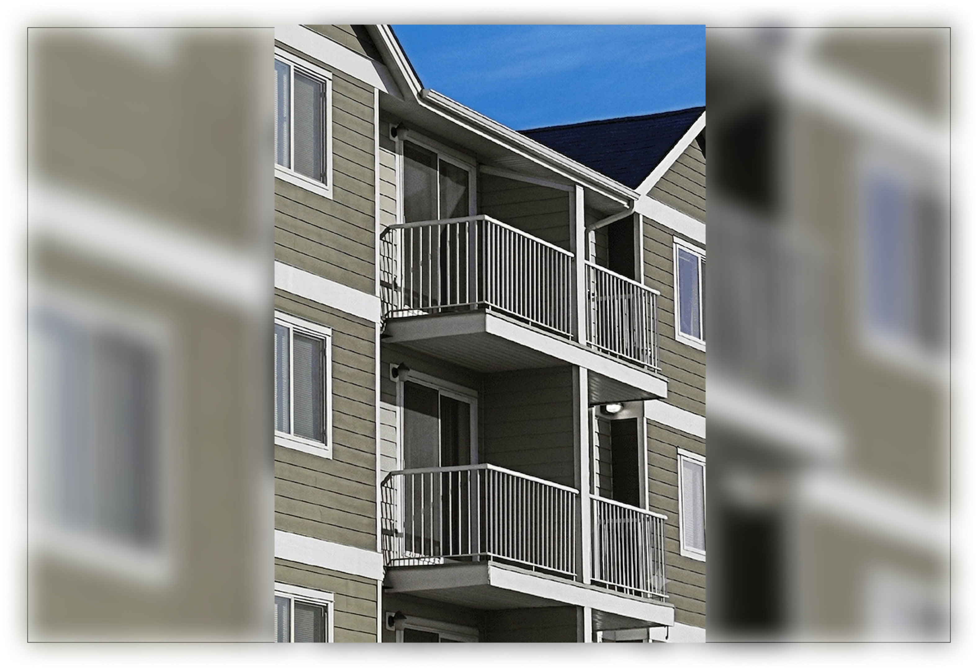 Three-story apartment building with balconies