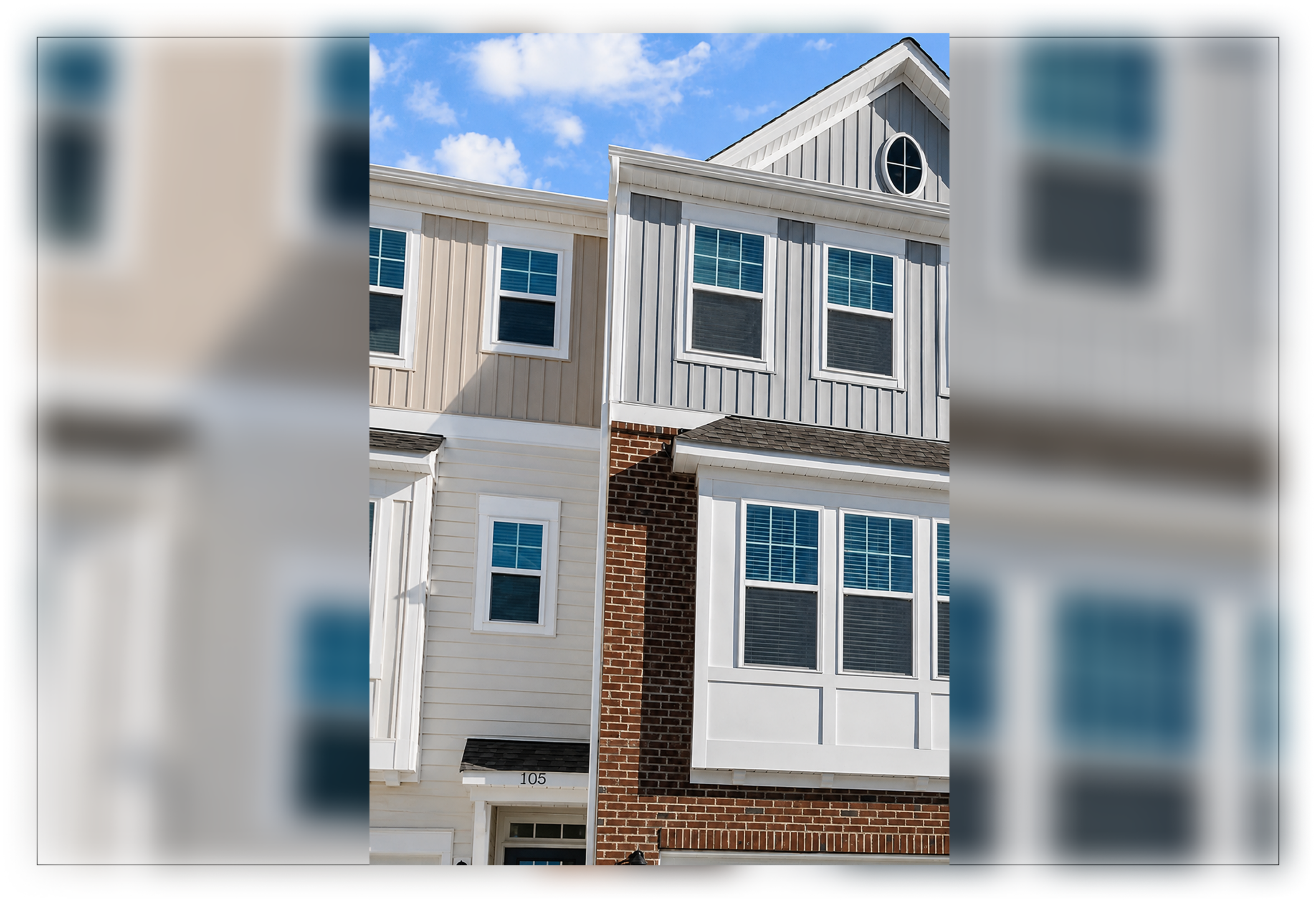 Modern townhouse exterior with brick and siding