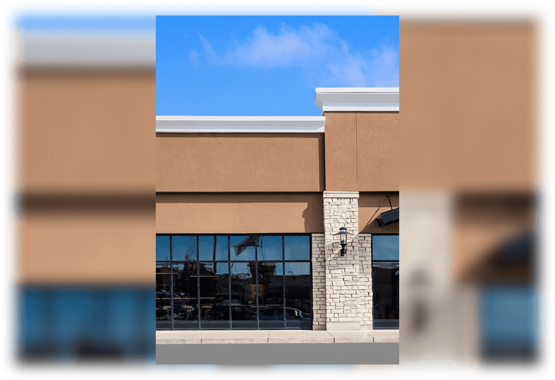 Empty storefront with stone column and windows