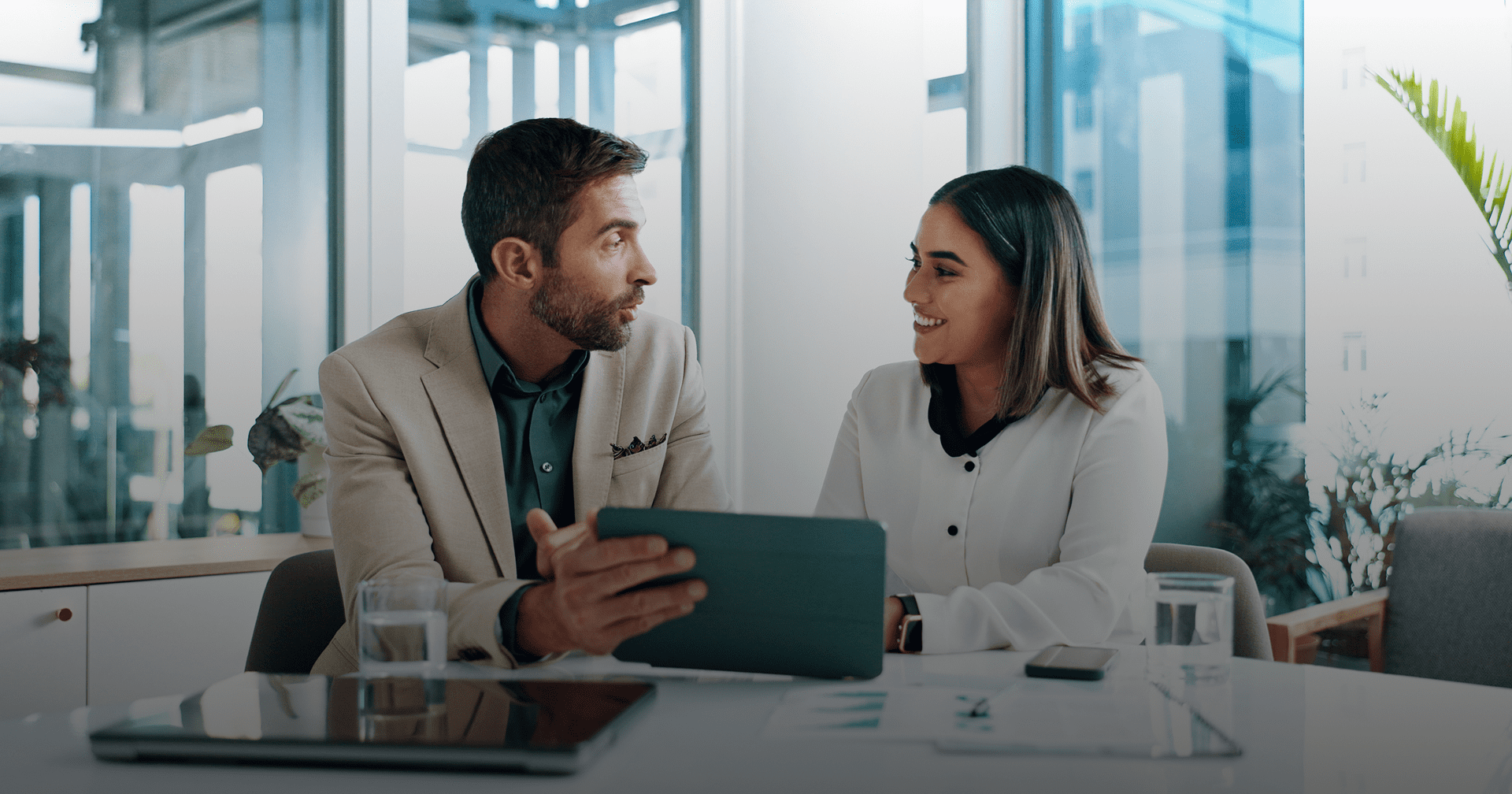 Professional conversation in bright office setting