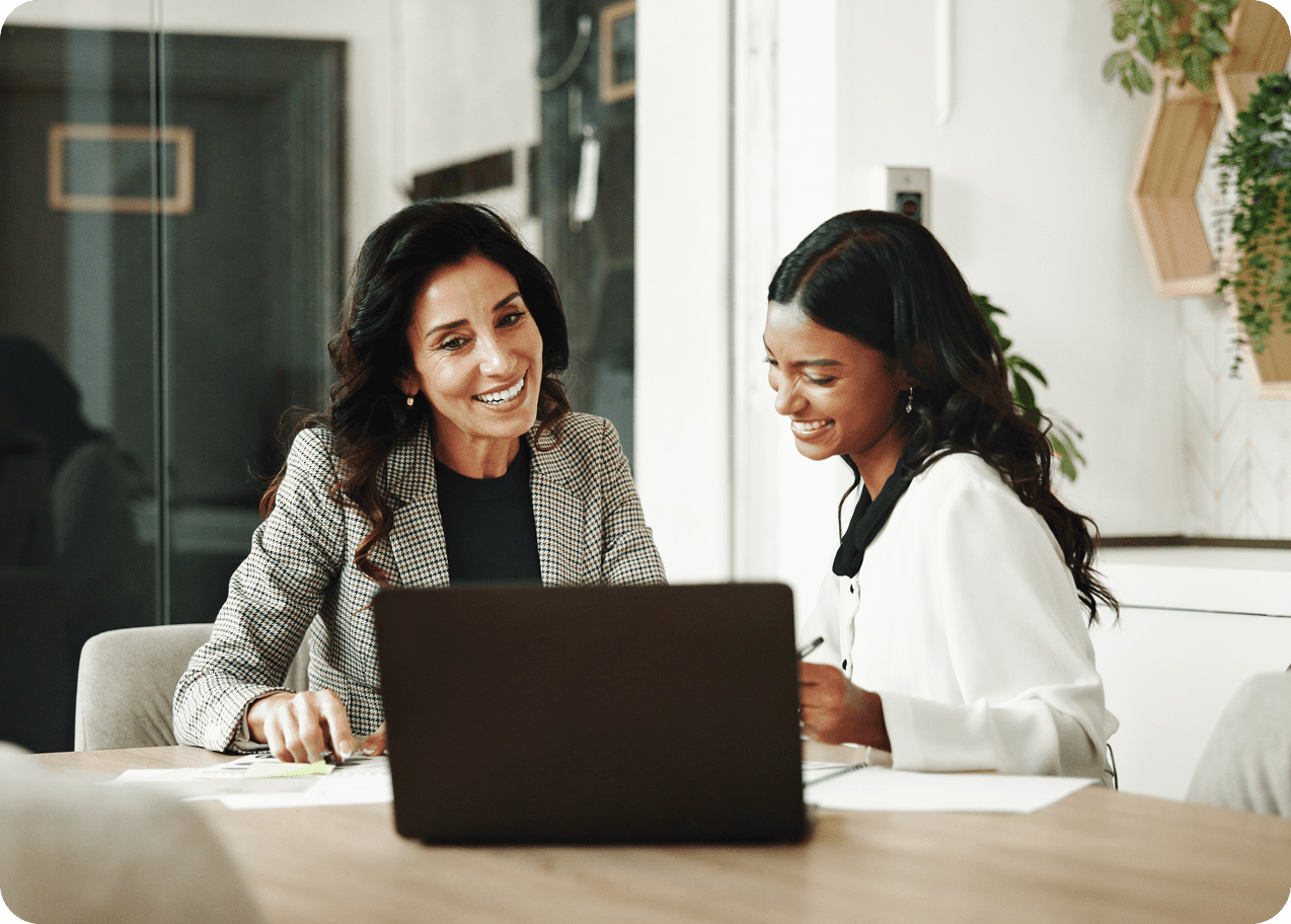 Two women collaborating at a desk
