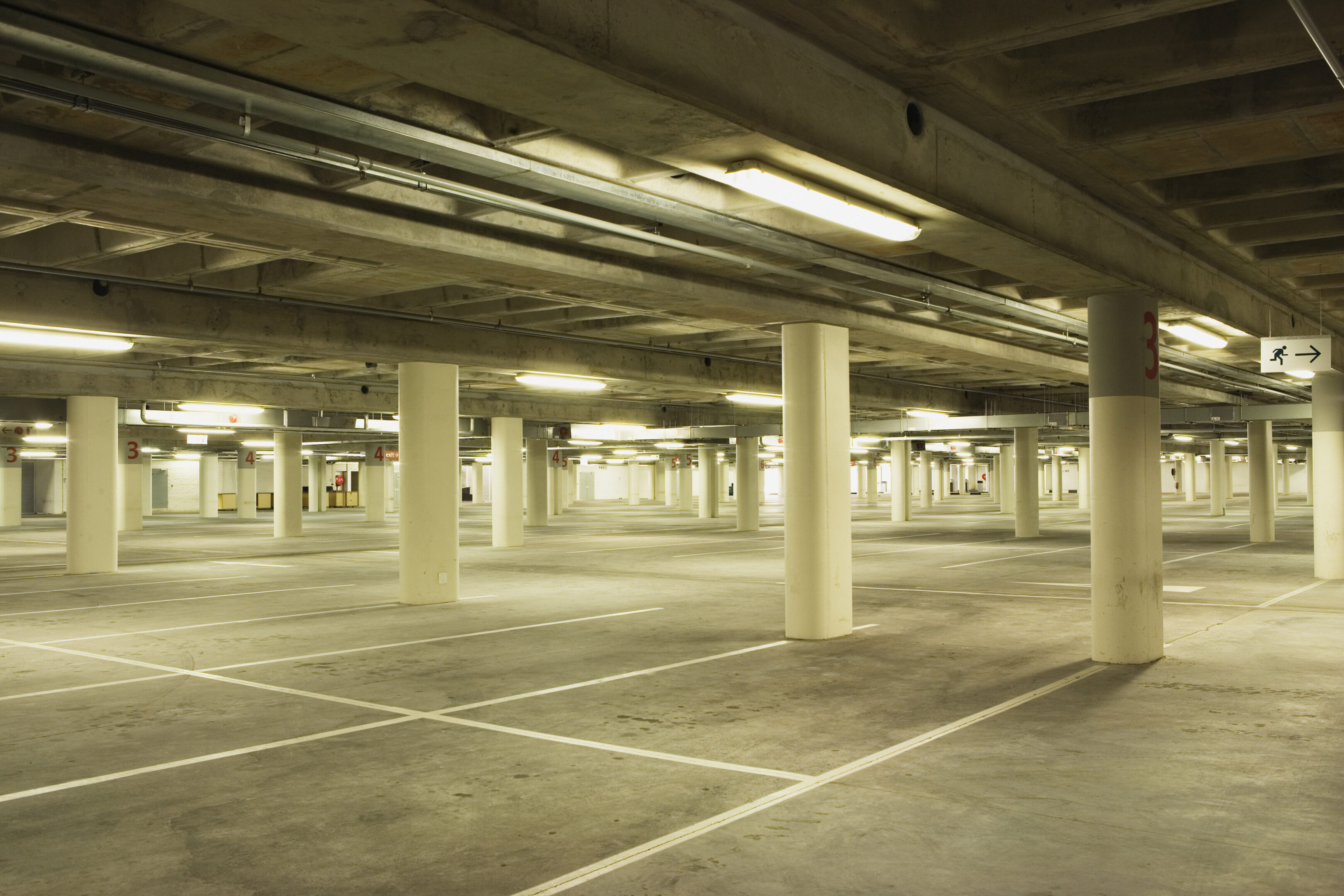 Empty illuminated underground carpark