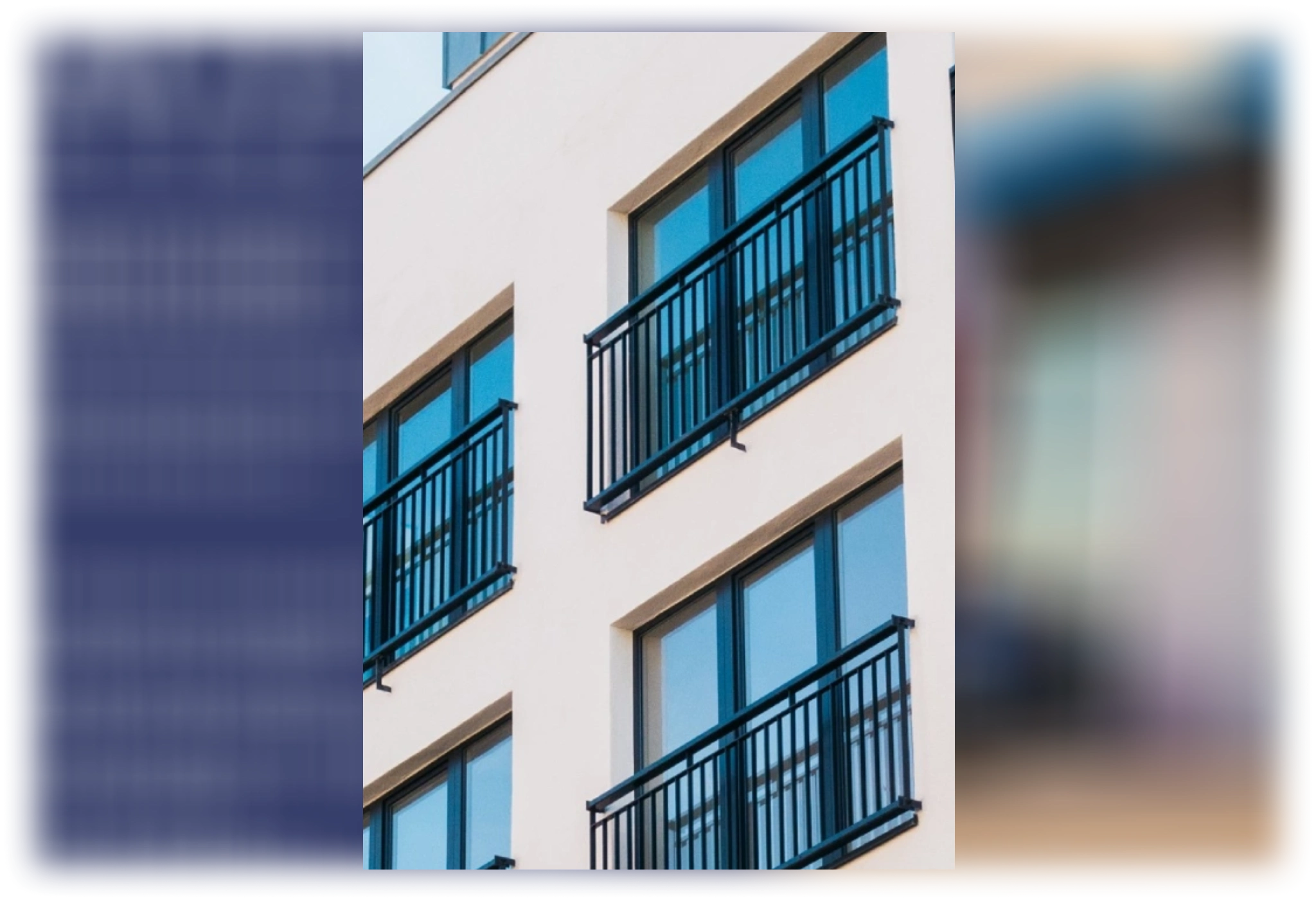 Modern apartment building with balcony railings